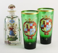 Lot 67 - A pair of green painted armorial glass beakers,...