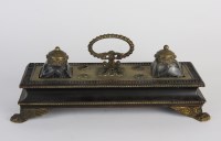Lot 86 - A 19th century Empire style ebonised and gilt...