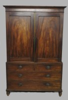 Lot 127 - A George III mahogany linen press, the moulded...