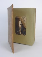 Lot 251 - A 20th century leather covered photo album...