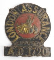 Lot 268 - A group of six pressed metal insurance company...