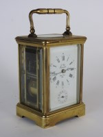 Lot 313 - A late 19th century carriage alarm clock, the...