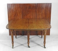 Lot 321 - A George IV mahogany dining table in the...