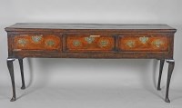 Lot 322 - A George III oak three drawer dresser base...