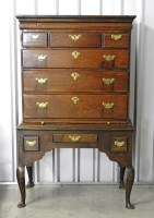 Lot 329 - A mid 18th century oak chest on stand the...