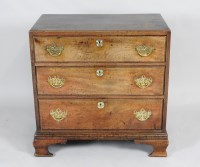 Lot 334 - A George III mahogany chest of three long...