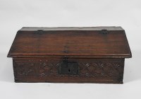 Lot 343 - A late 17th/early 18th century oak sloping top...