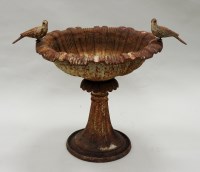 Lot 370 - An early 20th century cast-iron birdbath of...