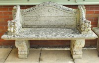 Lot 371 - A pair of reconstituted stone garden benches,...