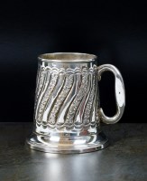 Lot 8 - An Egyptian silver mug, of embossed wrythen...