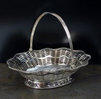 Lot 13 - A George III silver cake basket, William...