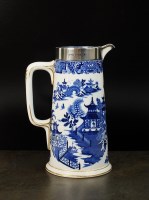 Lot 18 - A silver mounted jug, Horace Woodward & Co,...
