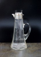 Lot 26 - An Edwardian silver mounted glass claret jug,...