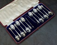Lot 58 - A cased set of twelve silver teaspoons and a...