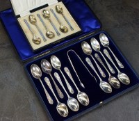 Lot 66 - An Edwardian cased set of twelve silver...