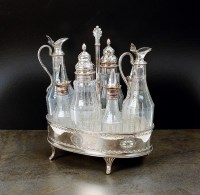 Lot 71 - An Old Sheffield plate cruet set, the silver...