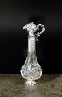 Lot 79 - A continental white metal mounted glass scent...