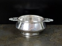 Lot 93 - A silver hammered porringer, A E Jones,...