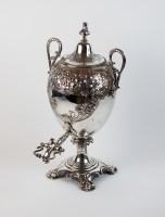 Lot 94 - A Victorian silver plated urn, with embossed...