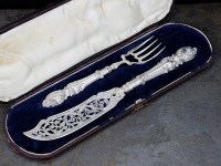 Lot 117 - A Victorian cased set of silver fish servers,...