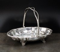 Lot 118 - An Edwardian Walker & Hall silver swing...