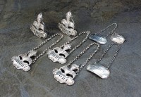 Lot 124 - A set of five Victorian knight topped decanter...