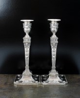 Lot 137 - A pair of Victorian silver candlesticks,...
