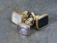 Lot 144 - An amethyst seal fob, together with a...