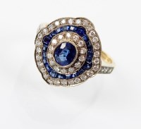 Lot 155 - An 18ct gold diamond and sapphire stylised...