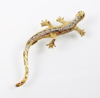 Lot 159 - A diamond and ruby set lizard brooch, not...