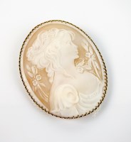 Lot 167 - A large oval shell cameo brooch, depicting the...