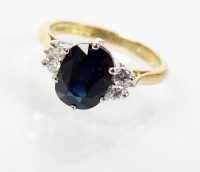 Lot 171 - An 18ct gold five stone sapphire and diamond...