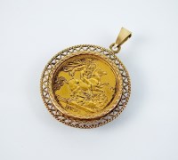Lot 175 - An Elizabeth II 1991 sovereign within 9ct gold...