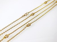 Lot 201 - A yellow metal decorative link guard chain,...