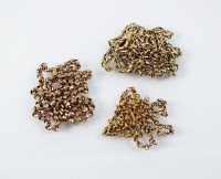 Lot 202 - A yellow metal faceted link chain, stamped '9c'...