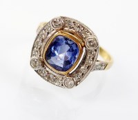 Lot 224 - An Art Deco sapphire and diamond cluster ring,...