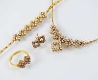 Lot 232 - An 18ct gold suite of diamond set jewellery,...