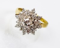 Lot 233 - An 18ct gold floral diamond cluster ring,...