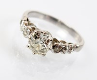 Lot 235 - A diamond set dress ring, designed as a...