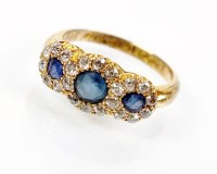 Lot 256 - An Edwardian 18ct gold diamond and sapphire...