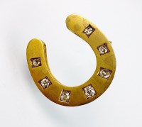 Lot 257 - A late 19th century diamond set horseshoe...