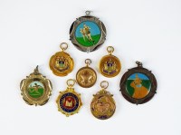 Lot 373 - Five 9ct gold and polychrome enamel medals,...