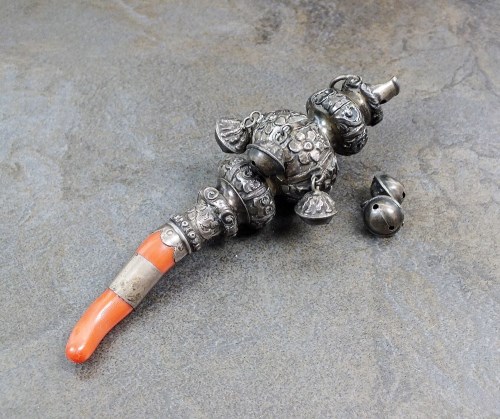 Lot 54 - A Victorian silver and coral rattle, whistle