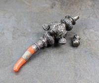 Lot 54 - A Victorian silver and coral rattle, whistle...