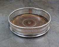 Lot 62 - A George III silver wine coaster, Richard...