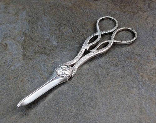 Lot 64 - A pair of Victorian silver grape scissors,...