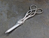 Lot 64 - A pair of Victorian silver grape scissors,...