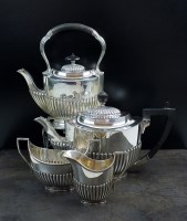 Lot 67 - An Edwardian four piece silver tea service,...