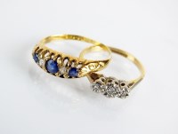 Lot 90 - An early 20th century 18ct gold five stone...