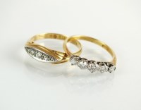 Lot 125 - A five stone graduated diamond ring, the...